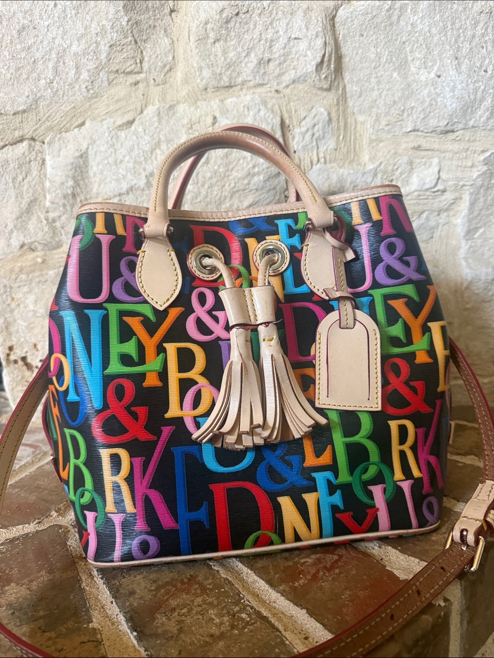 Dooney & Bourke Retro Multicolor Rainbow Letter-Print Tassel Drawsting Bag